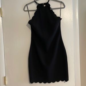 Likely black cocktail dress. Size 8